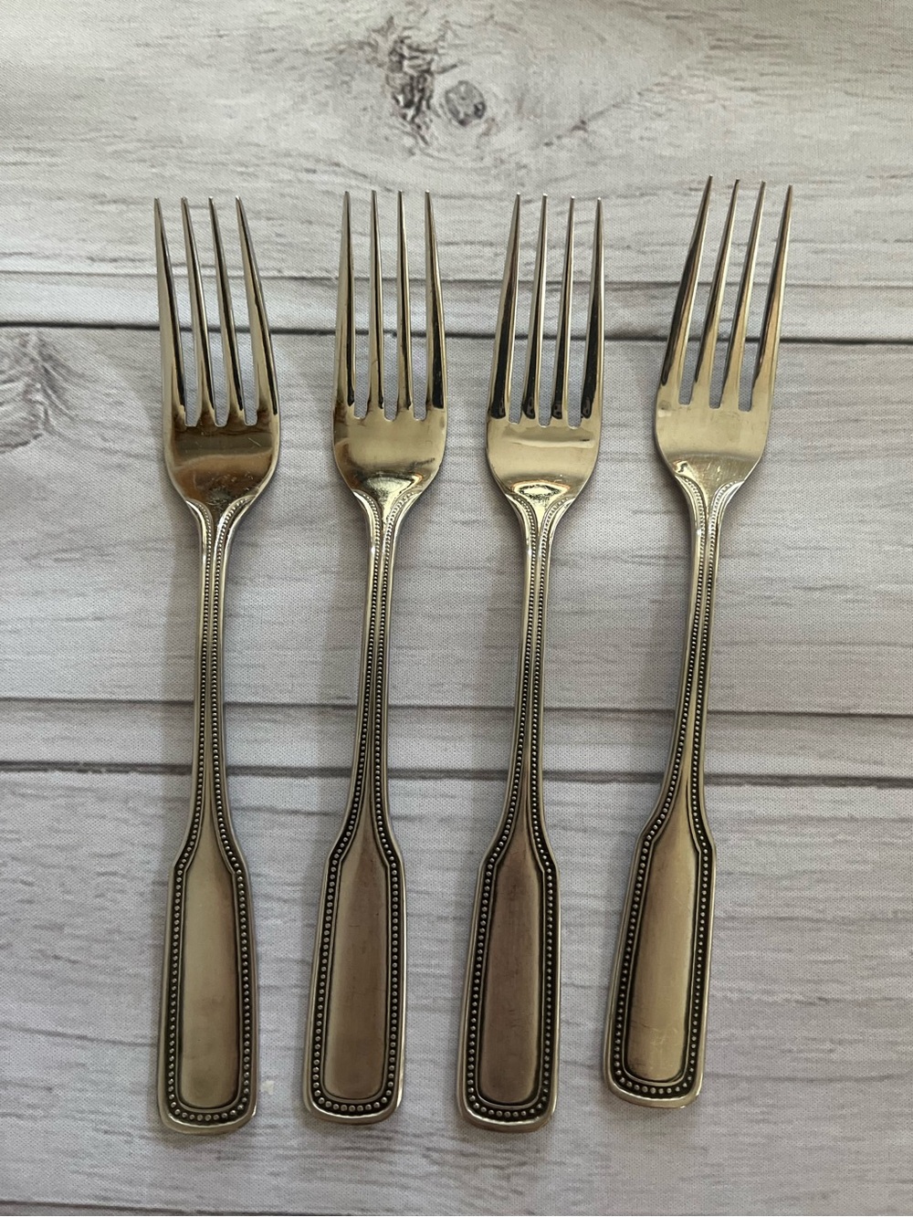 One set of 4 vintage Salem 1776 stainless steel beaded edge dinner forks.
